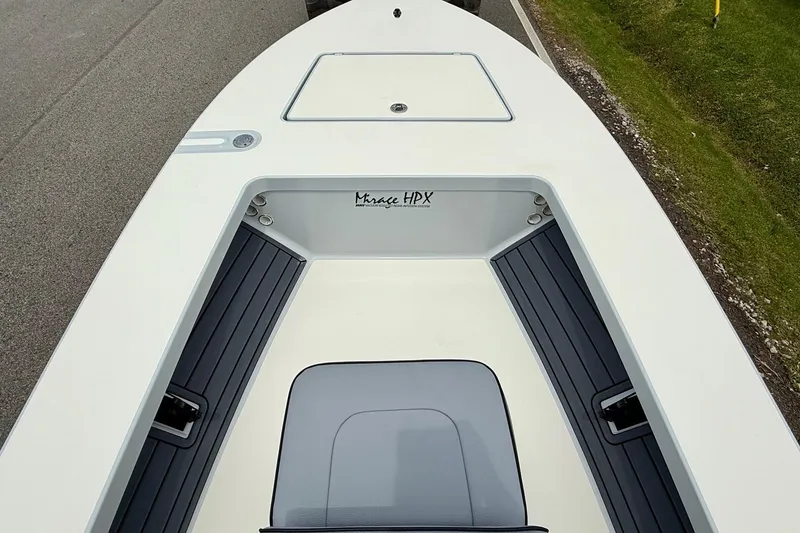 Slide: The Image of 2026 Maverick 17 HPX-S boat deck with storage compartments and sleek design. - 12