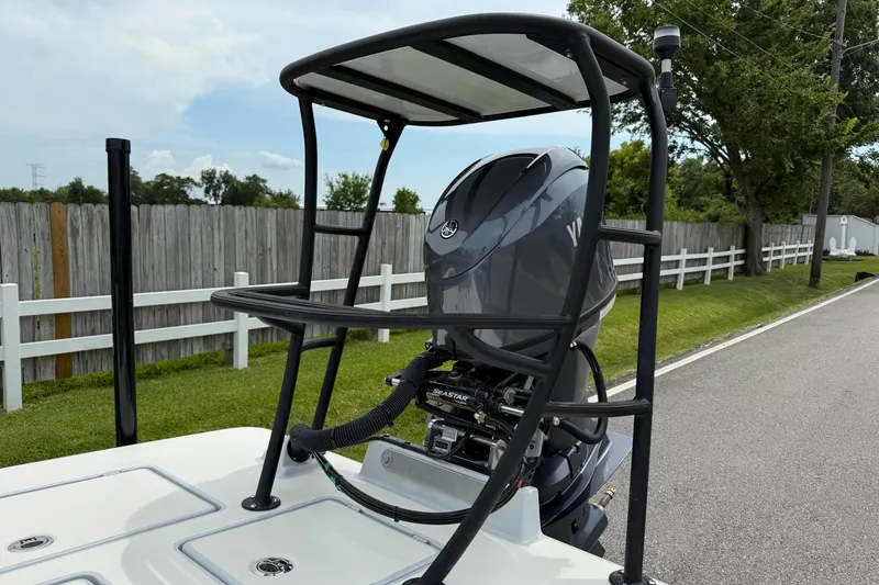 Slide: The Image of 2026 Maverick 17 HPX-S boat with Yamaha outboard motor and elevated platform. - 17