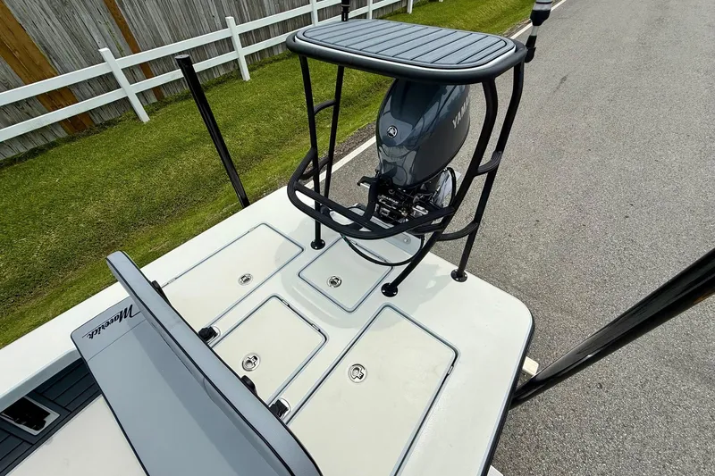 Slide: The Image of 2026 Maverick 17 HPX-S boat with Yamaha engine, viewed from above on a road. - 7