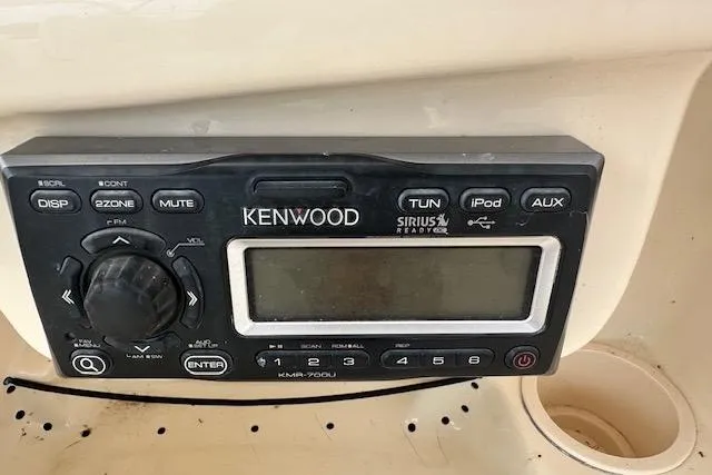 Slide: The Image of Bennett trim tab control panel on 2010 Grady-White Tournament 275 boat. - 10