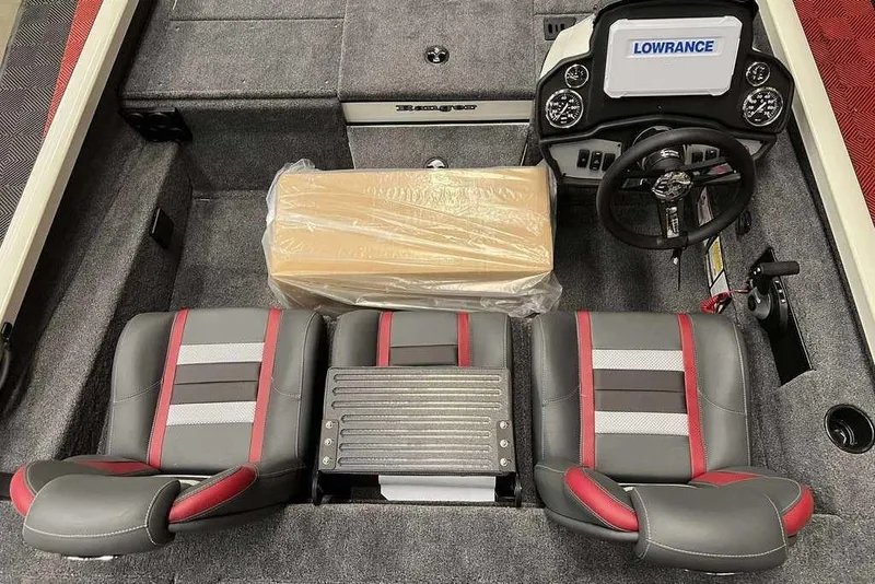 Slide: The Image of 2026 Ranger RT198P boat interior with dual seats, steering wheel, and Lowrance display. - 7