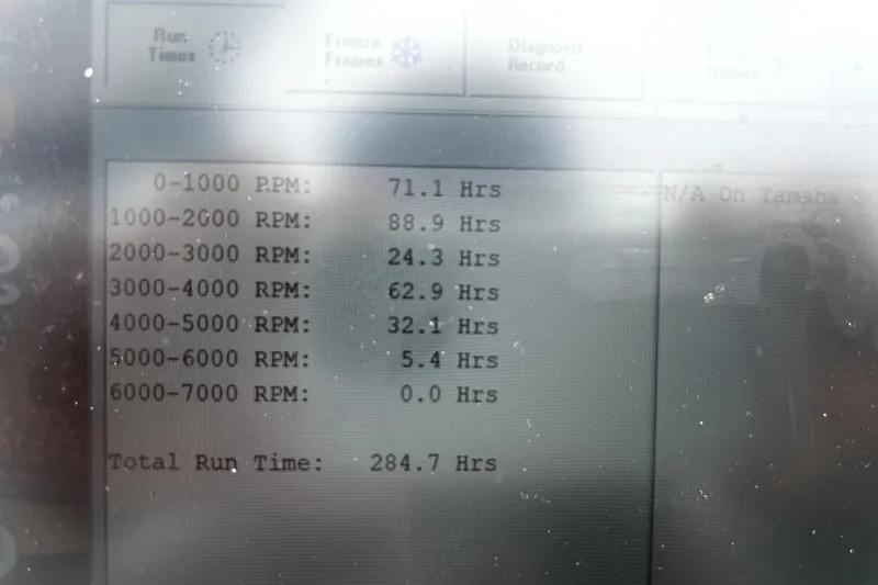 Slide: The Image of Display screen showing engine RPM hours for a 2008 Sea Hunt Ultra 196 boat. - 44