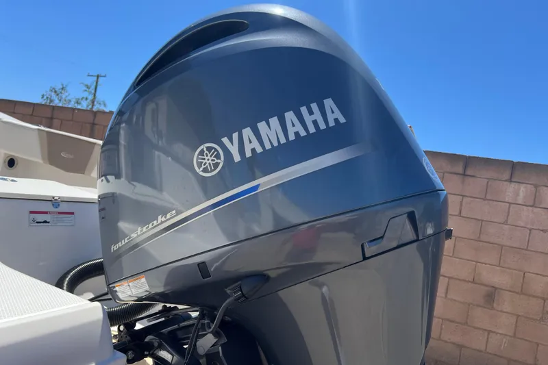 Slide: The Image of 2023 Robalo R200 Center Console with Yamaha four-stroke outboard motor. - 13