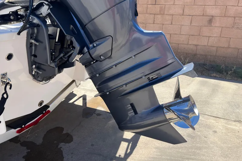 Slide: The Image of 2023 Robalo R200 Center Console boat with Yamaha outboard motor detail. - 14