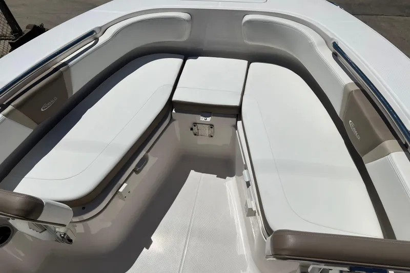 Slide: The Image of 2023 Robalo R200 Center Console boat interior with cushioned seating. - 23