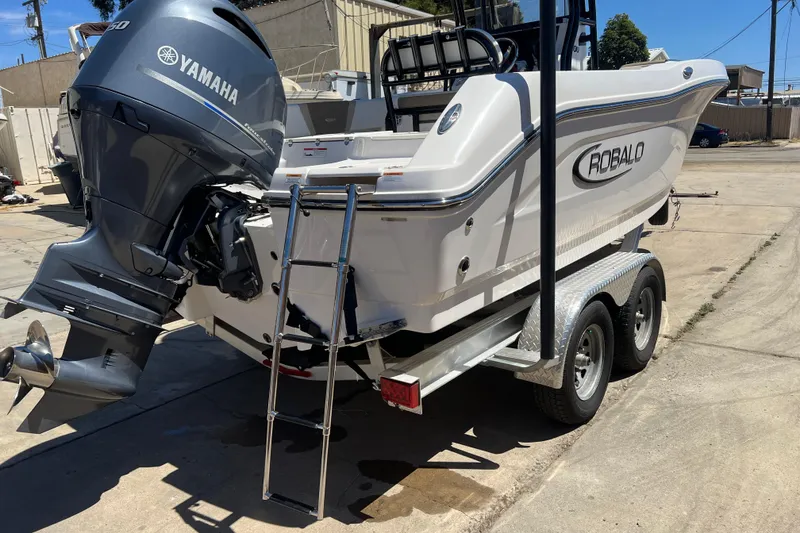 Slide: The Image of 2023 Robalo R200 Center Console boat with Yamaha engine on trailer. - 3