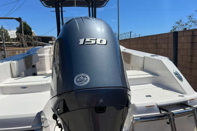 Slide: The Image of 2023 Robalo R200 Center Console with 150 HP engine, showcasing sleek design. - 33