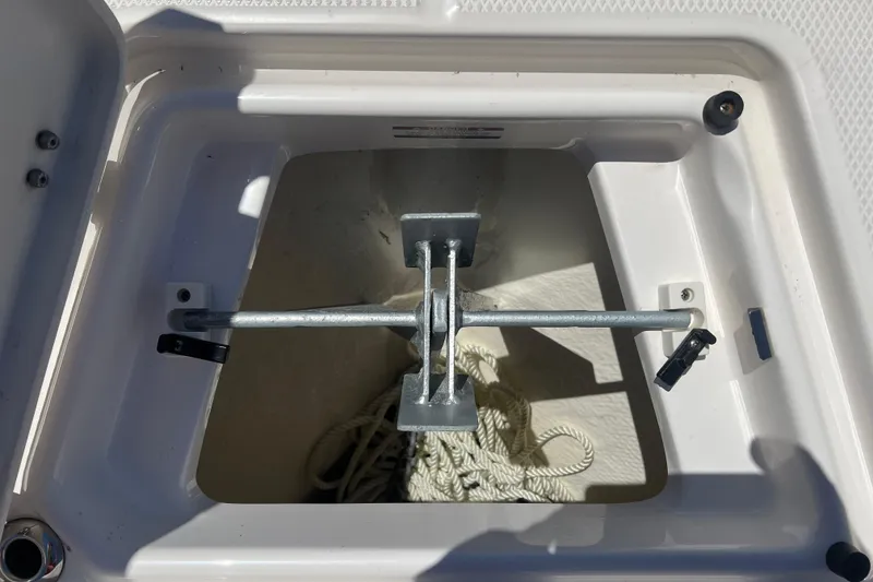 Slide: The Image of Anchor storage compartment on 2023 Robalo R200 Center Console boat. - 46