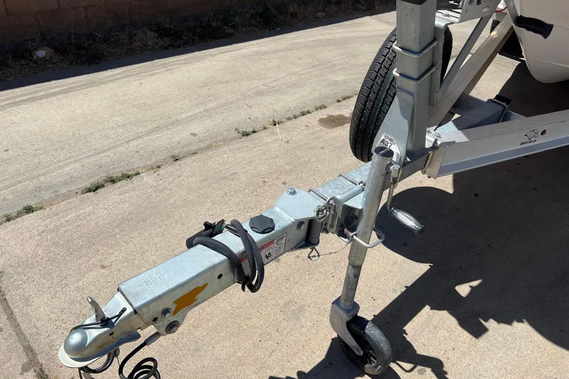 Slide: The Image of Trailer hitch of 2023 Robalo R200 Center Console boat on concrete surface. - 47