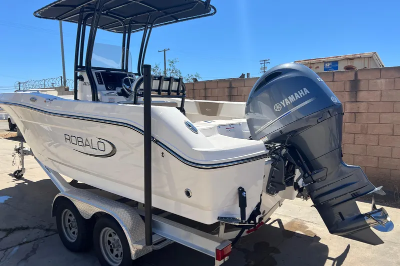 Slide: The Image of 2023 Robalo R200 Center Console boat with Yamaha engine on trailer. - 5