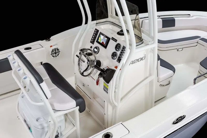 Slide: The Image of Manufacturer Provided Image: 2023 Robalo R200 Center Console boat interior with steering wheel and seating. - 56