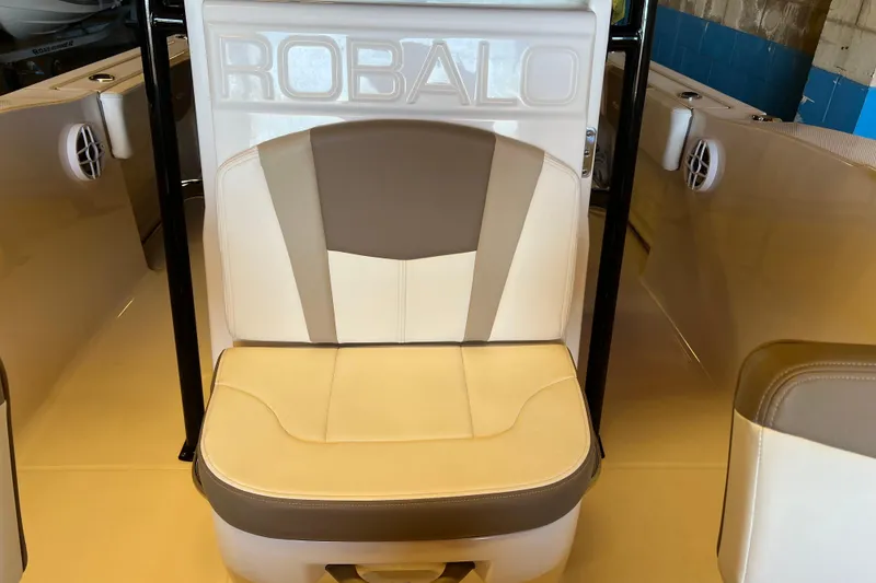 Slide: The Image of 2023 Robalo R200 Center Console boat seat with beige and brown upholstery. - 7