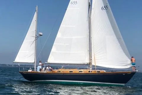 Slide: The Image of 1972 Cheoy Lee Offshore 47 Yawl sailing on open water under clear blue skies. - 3