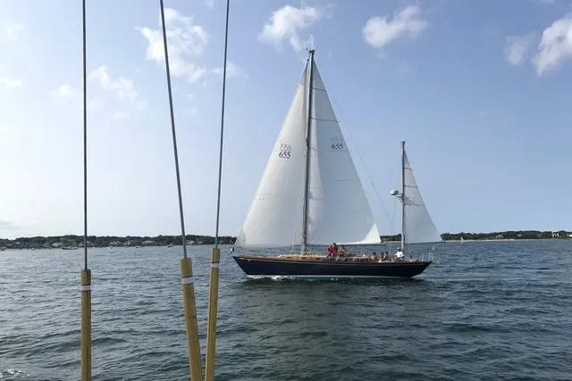 Slide: The Image of 1972 Cheoy Lee Offshore 47 Yawl sailing on a calm sea under a clear sky. - 32