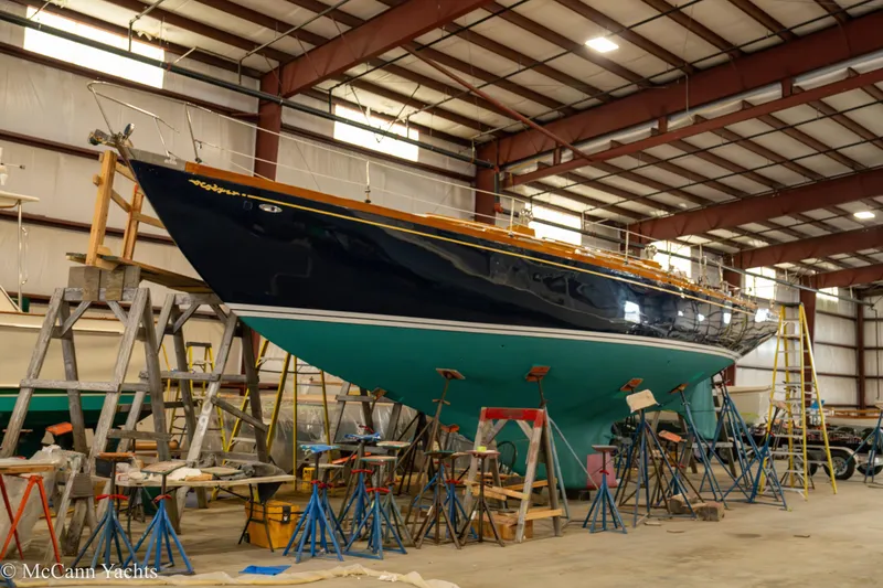 Slide: The Image of 1972 Cheoy Lee Offshore 47 Yawl in a boatyard, undergoing maintenance. - 6