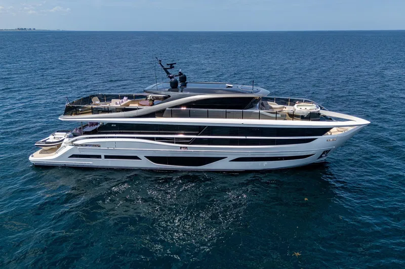Slide: The Image of Luxurious 2022 Princess X95 yacht cruising on open sea, showcasing sleek design and spacious decks. - 12