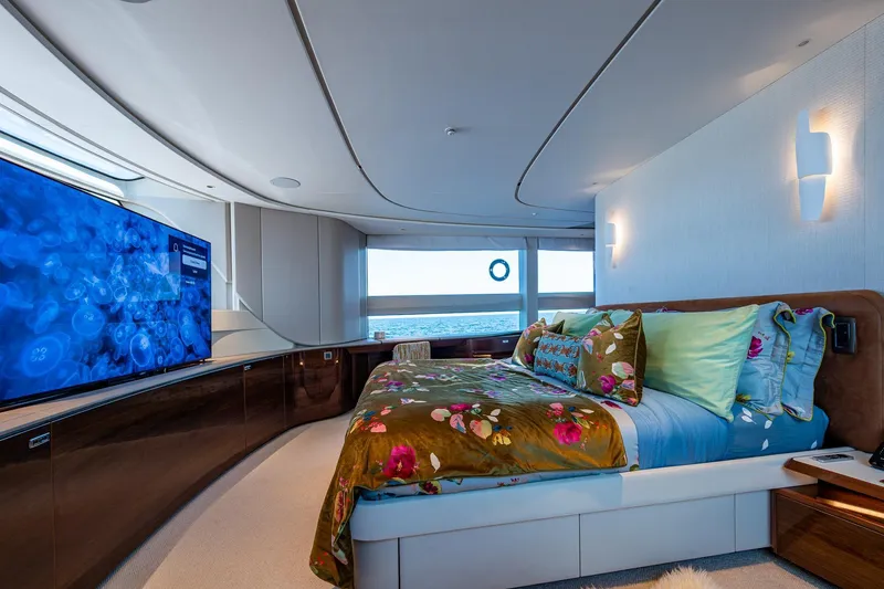 Slide: The Image of Luxurious bedroom interior of 2022 Princess X95 yacht with ocean view and modern decor. - 38