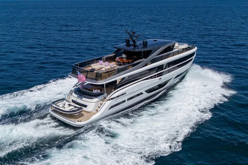 Slide: The Image of Luxurious 2022 Princess X95 yacht cruising on open sea, showcasing sleek design and spacious decks. - 48