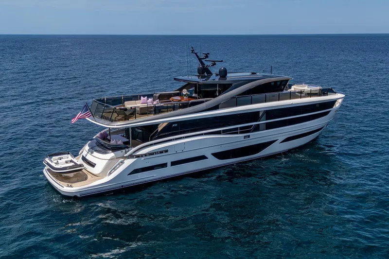 Slide: The Image of Luxurious 2022 Princess X95 yacht cruising on open sea, showcasing sleek design and elegance. - 5