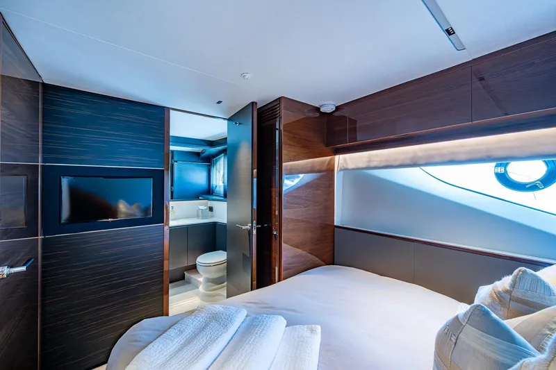 Slide: The Image of Luxurious interior of 2022 Princess X95 yacht cabin with modern design and ensuite bathroom. - 73