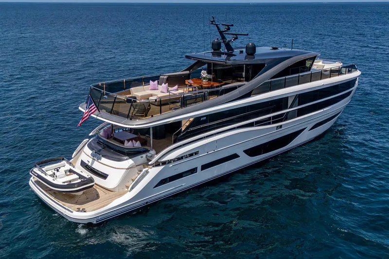 Slide: The Image of Luxurious 2022 Princess X95 yacht cruising on open sea, featuring spacious decks and modern design. - 75