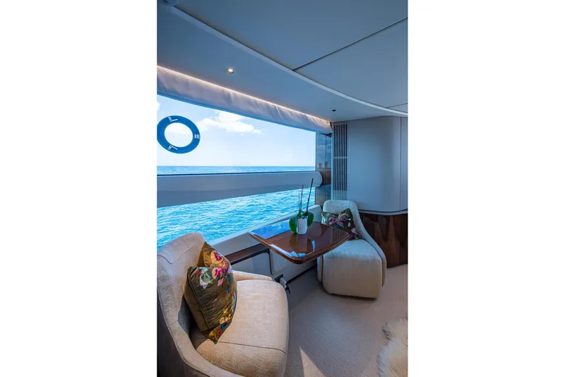 Slide: The Image of Luxurious interior of 2022 Princess X95 yacht with ocean view and elegant seating. - 90