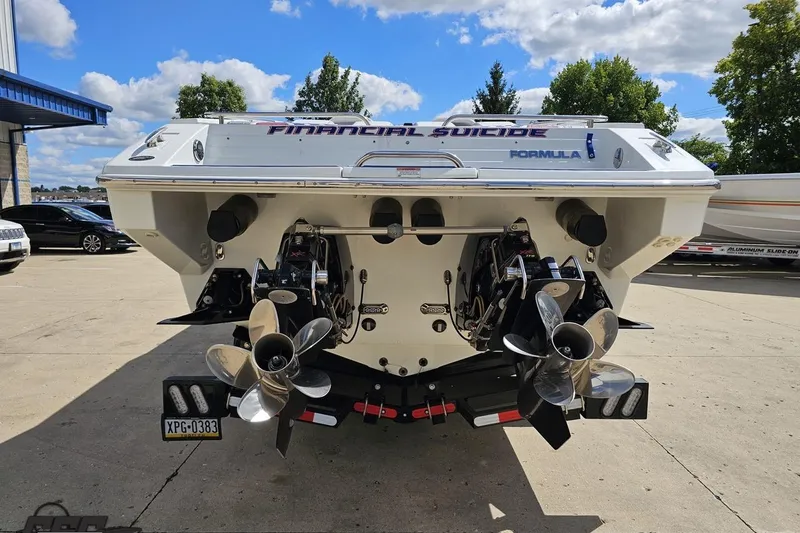 Slide: The Image of Rear view of 2012 Formula 382 FASTech boat with dual propellers on a sunny day. - 19