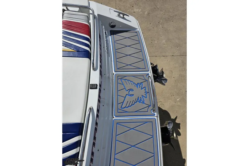 Slide: The Image of 2012 Formula 382 FASTech boat deck with eagle design and colorful seating. - 20