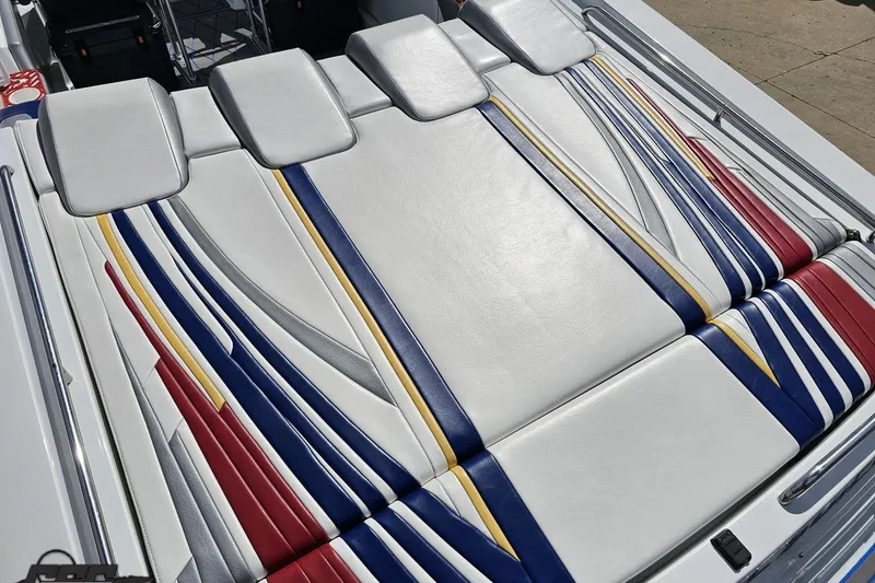Slide: The Image of 2012 Formula 382 FASTech boat with colorful, striped upholstery design. - 23