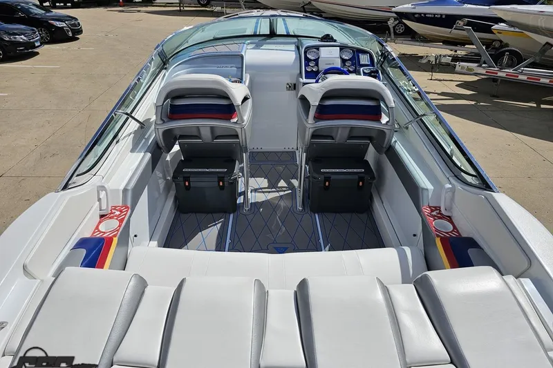 Slide: The Image of 2012 Formula 382 FASTech boat interior with dual seats and dashboard view. - 28