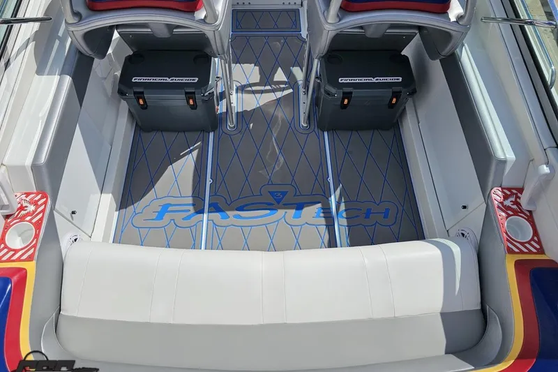 Slide: The Image of 2012 Formula 382 FASTech boat interior with custom seating and logo flooring. - 31