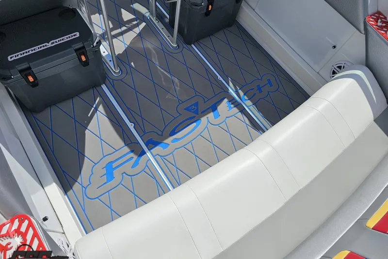 Slide: The Image of 2012 Formula 382 FASTech boat interior with custom flooring and seating. - 32