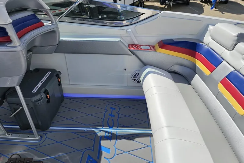 Slide: The Image of Interior of a 2012 Formula 382 FASTech boat with colorful seating and modern design. - 33