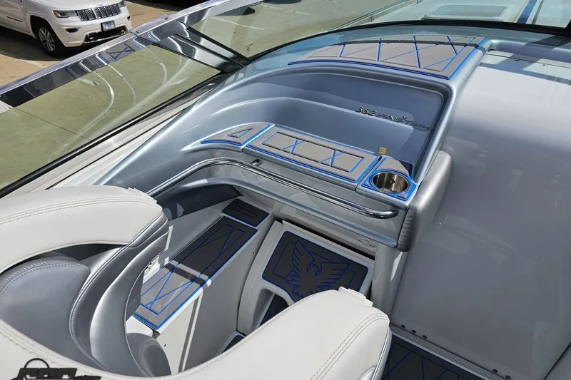 Slide: The Image of Interior of a 2012 Formula 382 FASTech boat with sleek design and blue accents. - 39