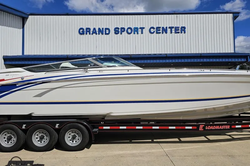 Slide: The Image of 2012 Formula 382 FASTech boat on trailer at Grand Sport Center. - 4