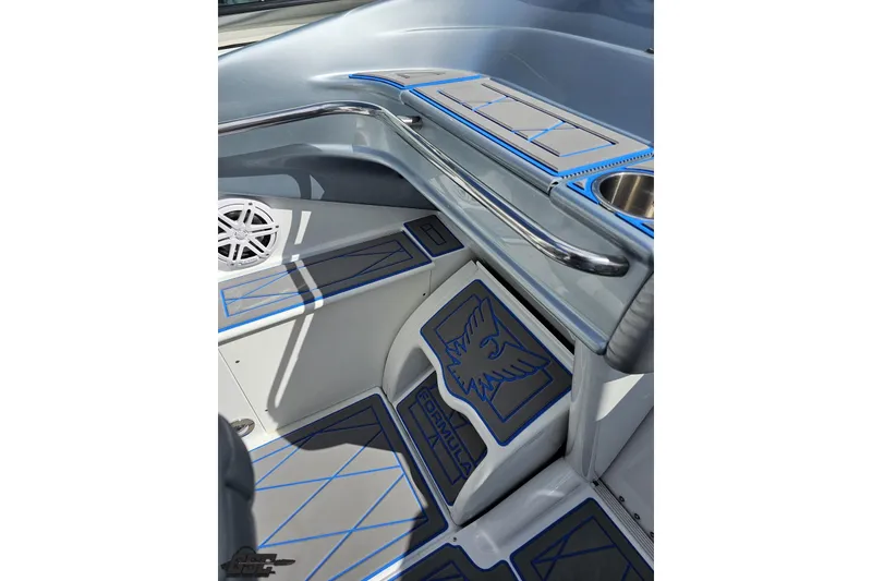 Slide: The Image of Interior of 2012 Formula 382 FASTech boat with sleek design and blue accents. - 41