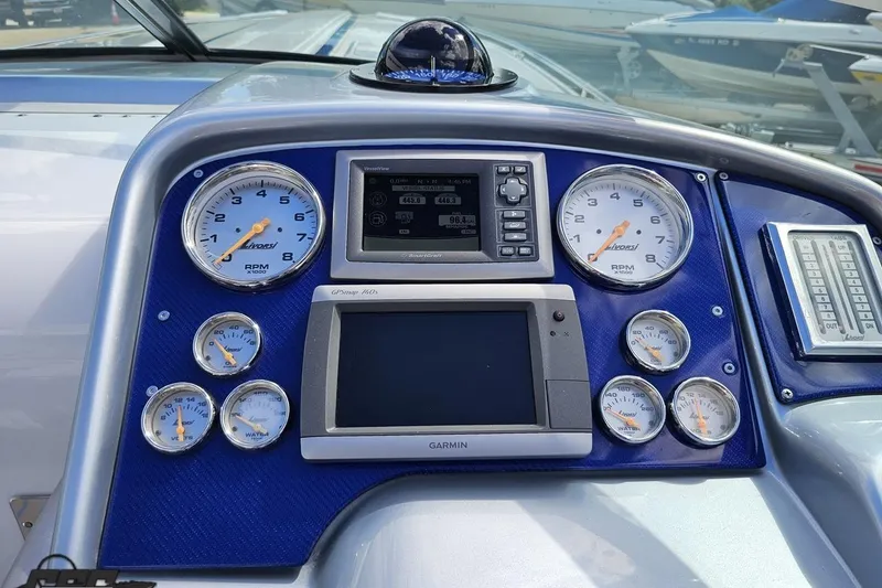 Slide: The Image of Dashboard of a 2012 Formula 382 FASTech boat with gauges and navigation system. - 45