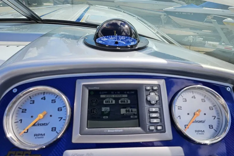 Slide: The Image of Dashboard of 2012 Formula 382 FASTech boat with gauges and navigation system. - 46