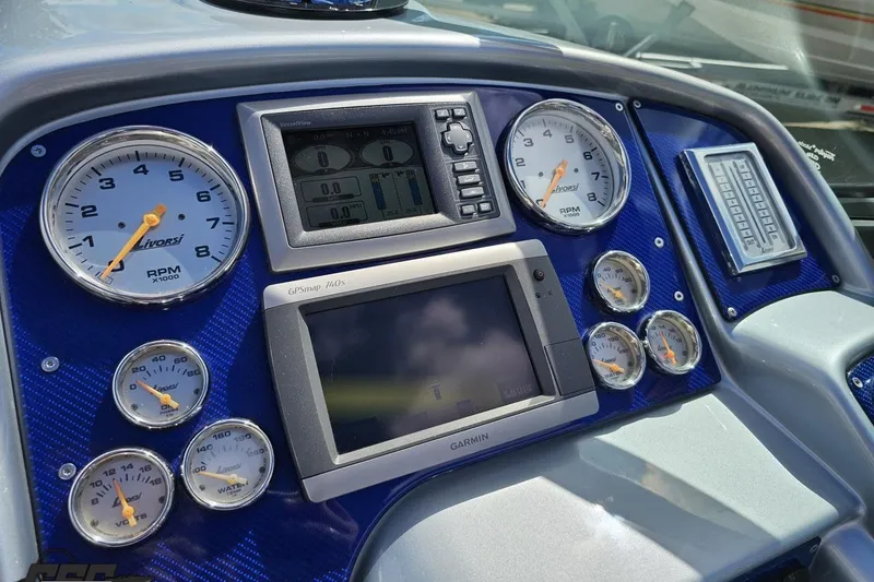 Slide: The Image of Dashboard of a 2012 Formula 382 FASTech with gauges and Garmin GPS. - 47