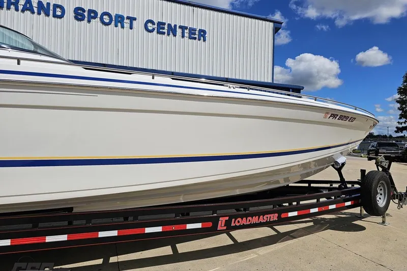 Slide: The Image of 2012 Formula 382 FASTech boat on Loadmaster trailer at Grand Sport Center. - 5