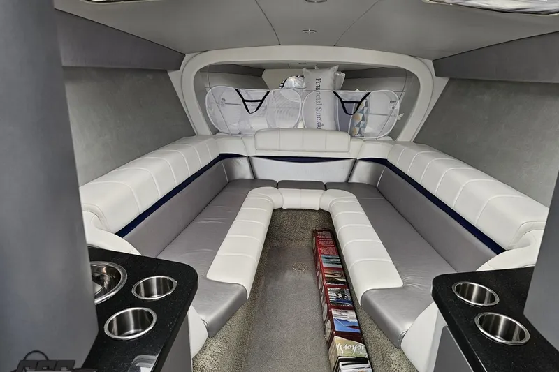 Slide: The Image of Luxurious interior of a 2012 Formula 382 FASTech boat with plush seating and cup holders. - 56