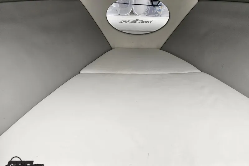 Slide: The Image of Interior cabin of 2012 Formula 382 FASTech boat, featuring white cushioned seating. - 62