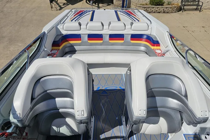 Slide: The Image of 2012 Formula 382 FASTech boat interior with colorful seating and sleek design. - 68