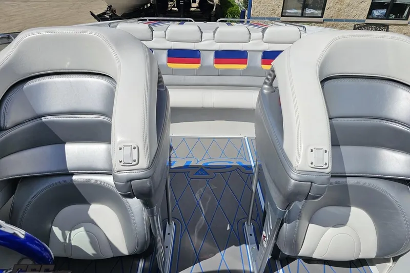 Slide: The Image of 2012 Formula 382 FASTech boat interior with gray leather seats and colorful accents. - 69