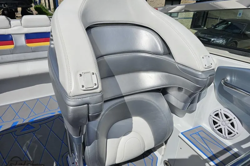 Slide: The Image of 2012 Formula 382 FASTech boat interior with gray and white leather seating and colorful accents. - 70