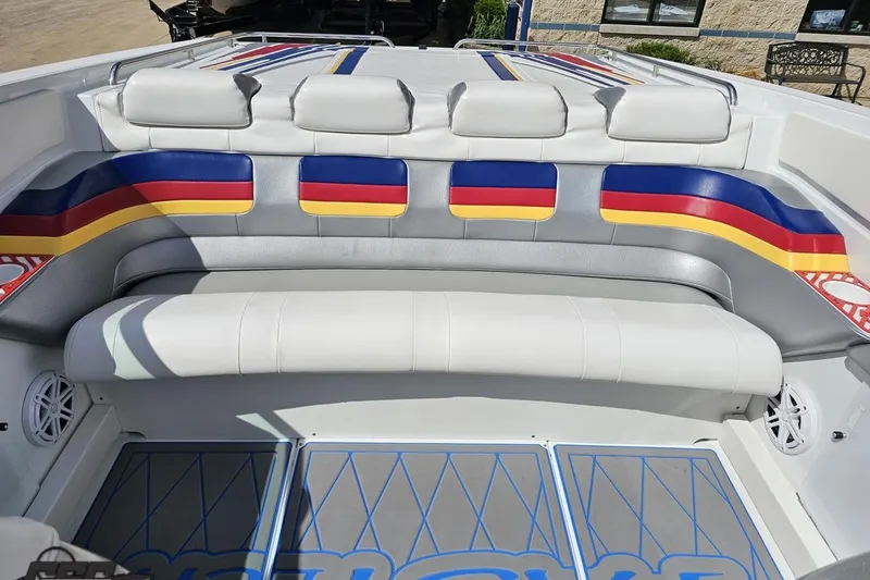 Slide: The Image of 2012 Formula 382 FASTech boat interior with colorful seating and sleek design. - 72