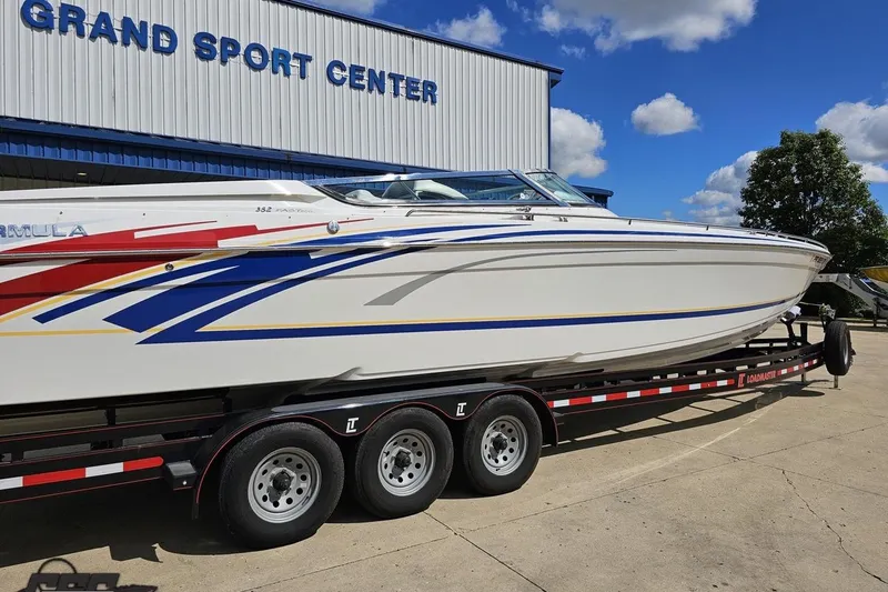 Slide: The Image of 2012 Formula 382 FASTech boat on trailer at Grand Sport Center. - 9