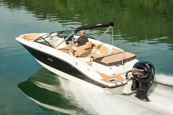 Slide: The Image of 2019 Sea Ray SPX 210 OB boat cruising on a lake. - 26