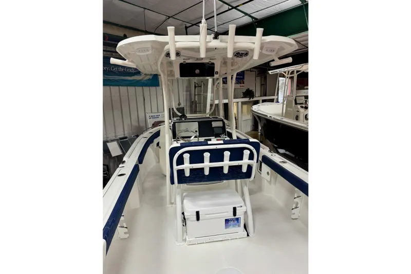 Slide: The Image of 2026 Parker 23SE Center Console boat interior with seating and console features. - 5