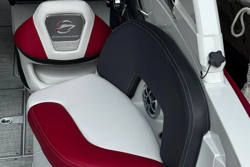 Slide: The Image of 2026 Crownline 298 SS boat interior with red and white seating. - 3